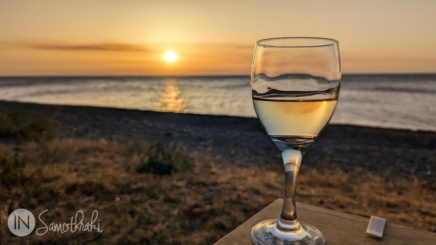 Sunset at a tavern on the north shore of the island