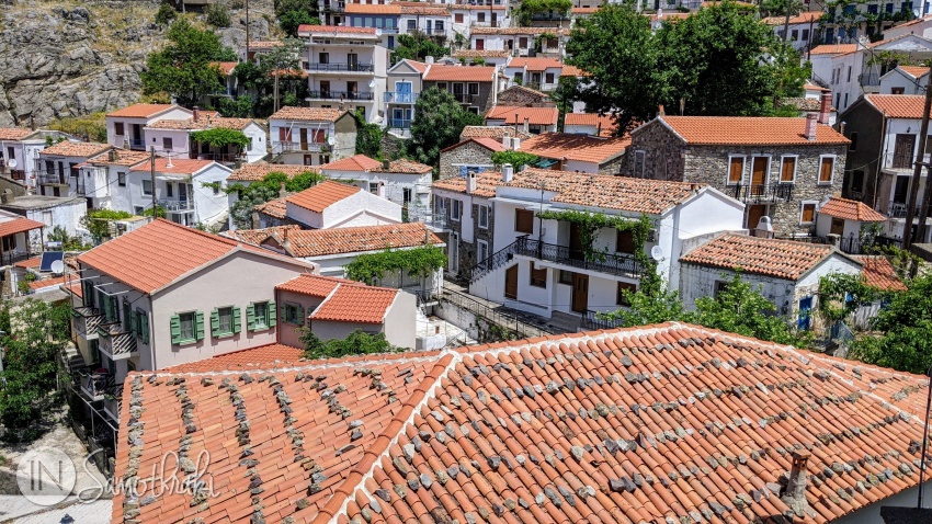 The stones protect the roofs from the strong winds.