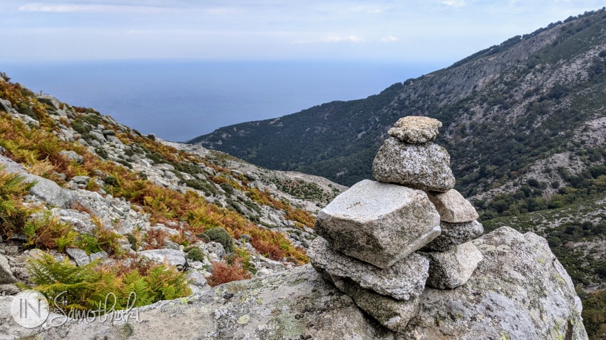 At higher altitudes, stone piles built by other hikers can help you find your way.