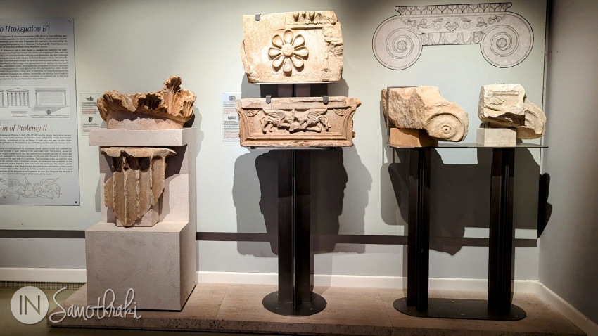 Capitels and colored fragments with flowers and griffins from Ptolemy's Propylaea